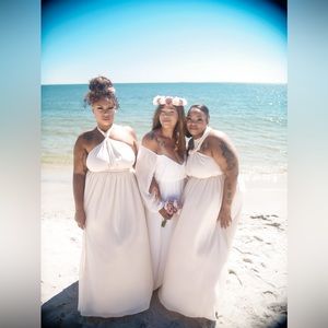 (Dress to the far left) Wedding bridesmaid dress.